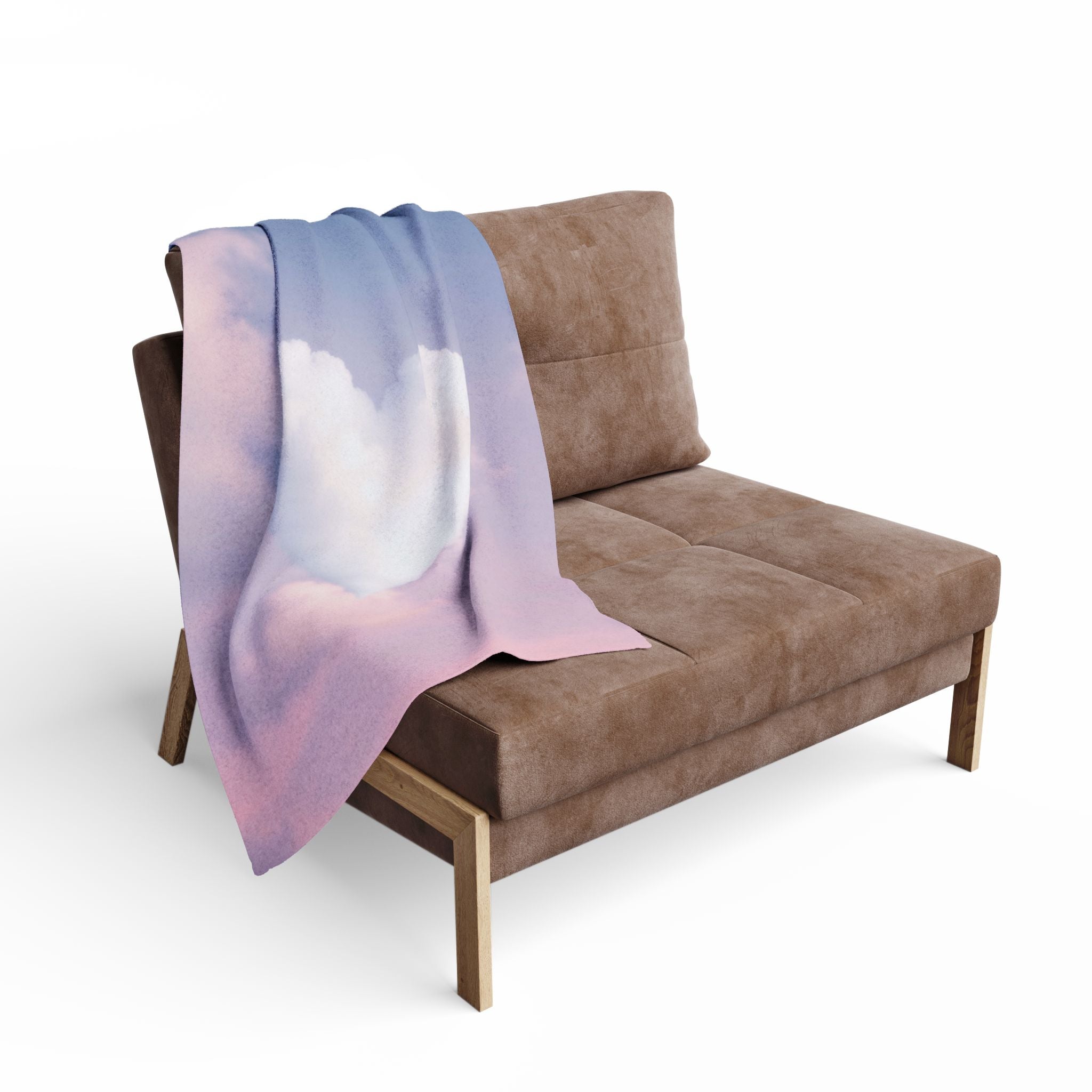 Fleece blanket featuring a heart shaped cloud on a pink sky draped over a brown chair on a white background.