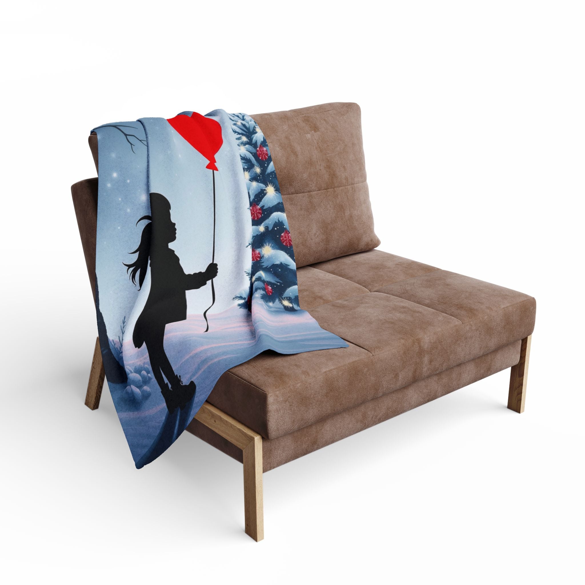 Decorative blanket with a silhouette of a girl holding a red balloon at christmas design draped over a brown sofa.