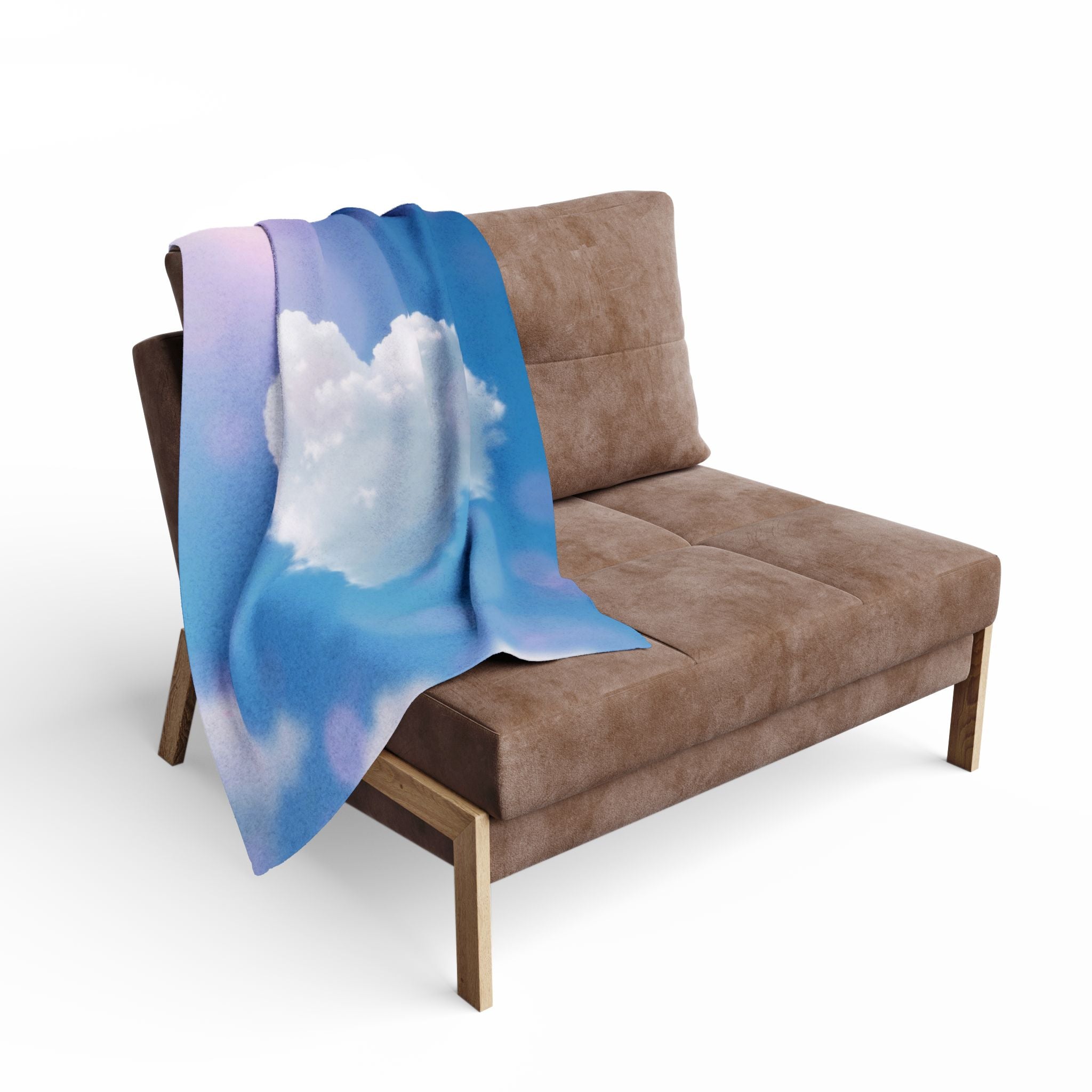 Brown sofa with a white heart shaped cloud fleece blanket draped over it on a white background.