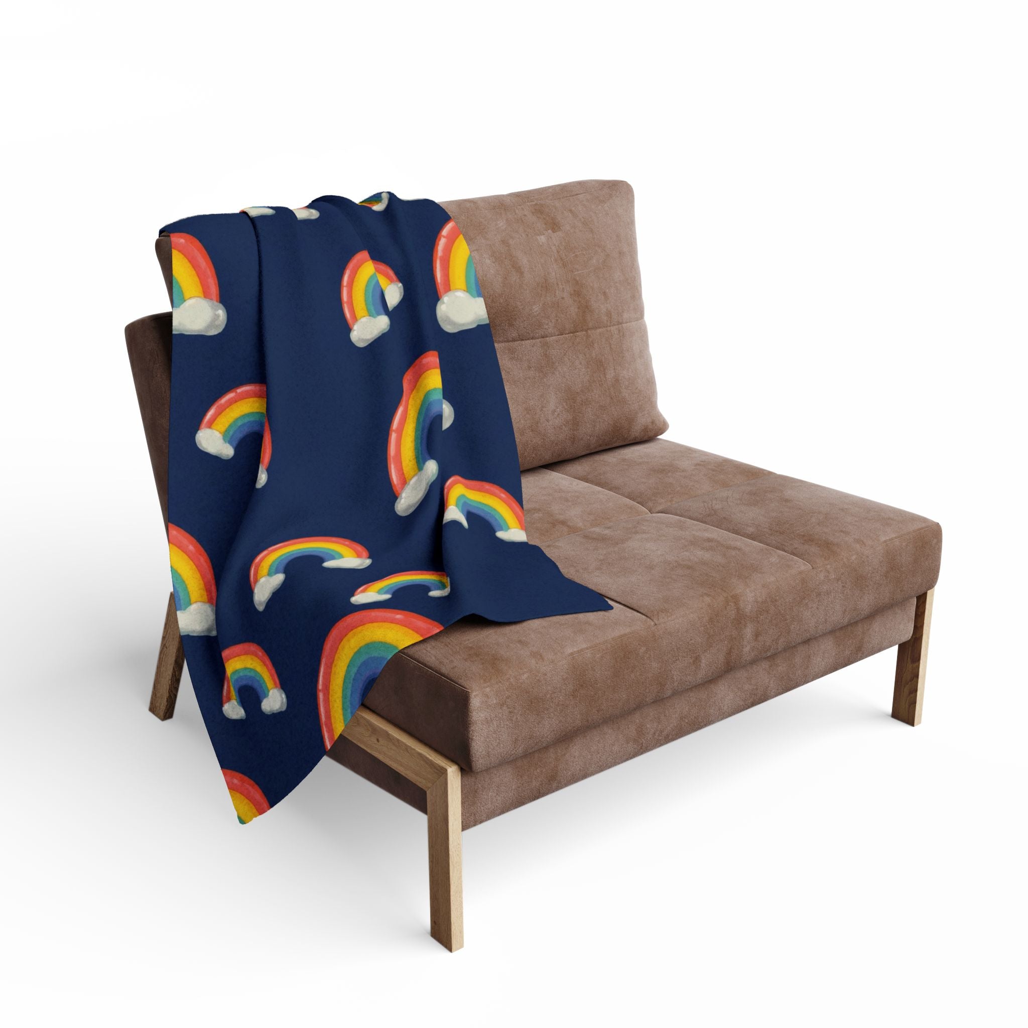 Navy blanket with colorful rainbows draped over a brown sofa.