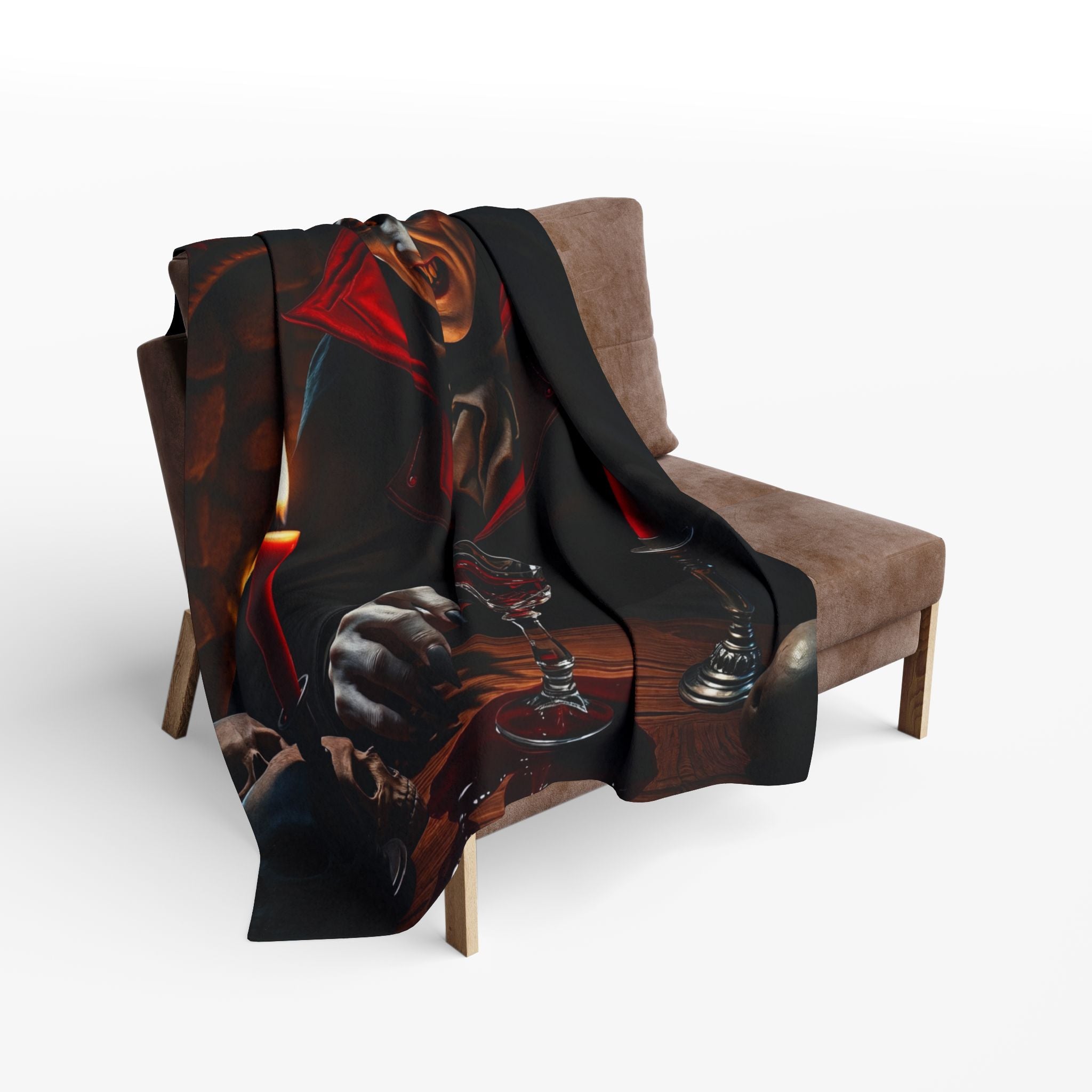 Decorative halloween fleece blanket of count dracula draped over a chair on a white background.