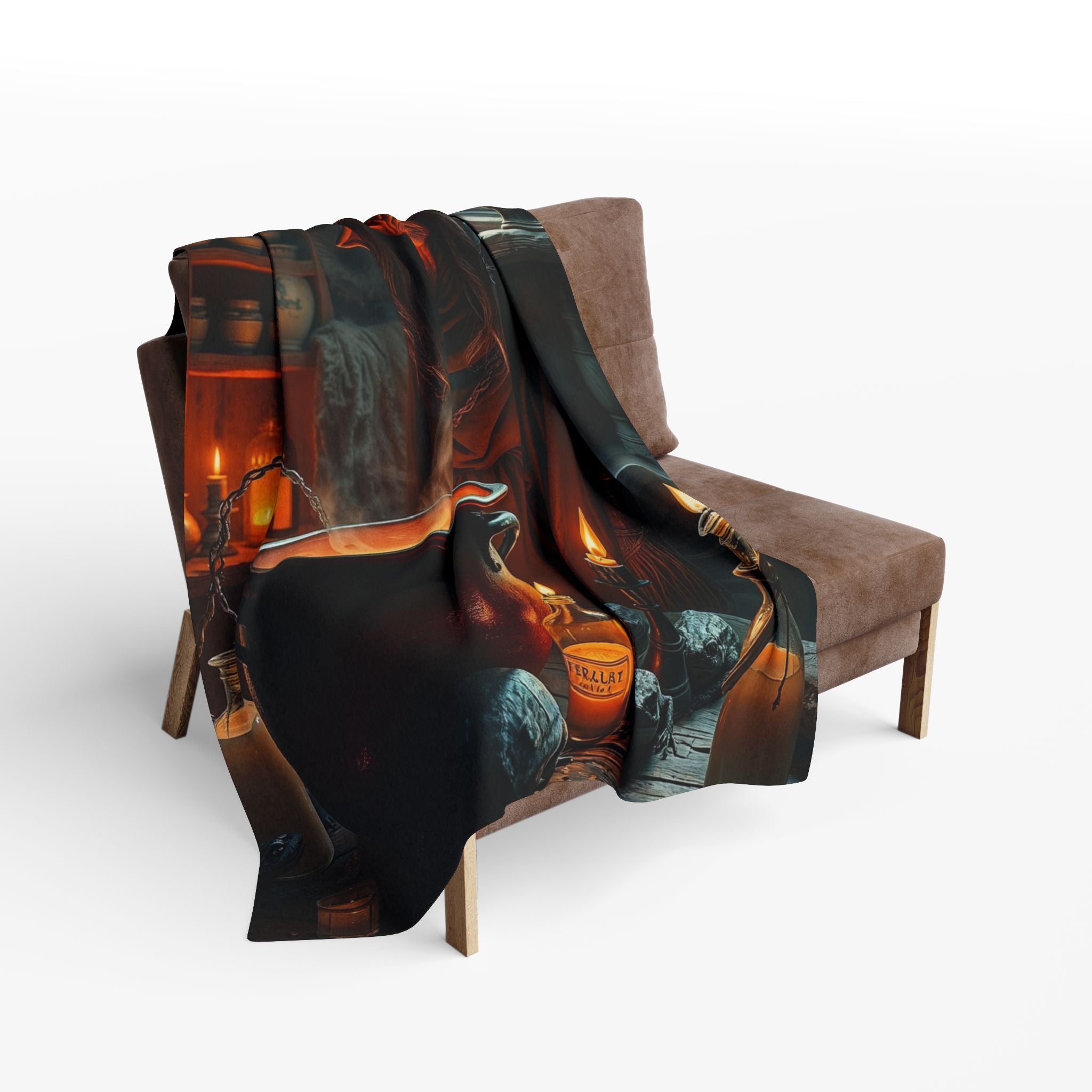 Decorative blanket with a halloween witch design draped over a brown chair on a white background.