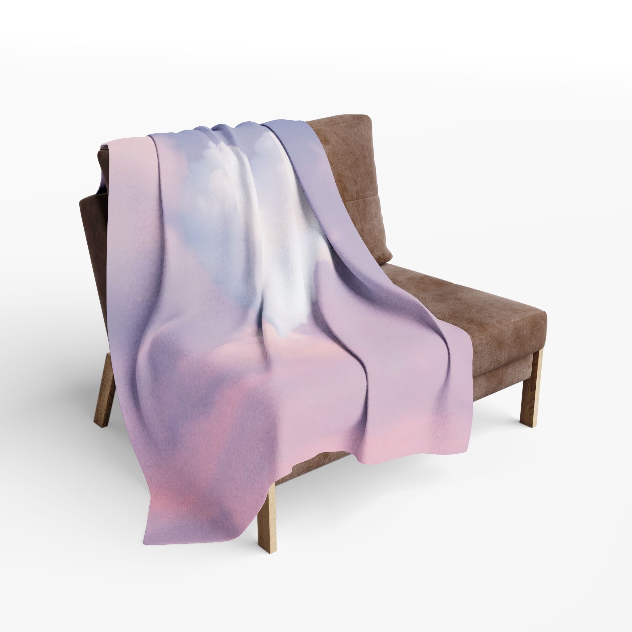 Heart shaped cloud on a purple and pink gradient sky fleece blanket draped over a brown chair on a white background.