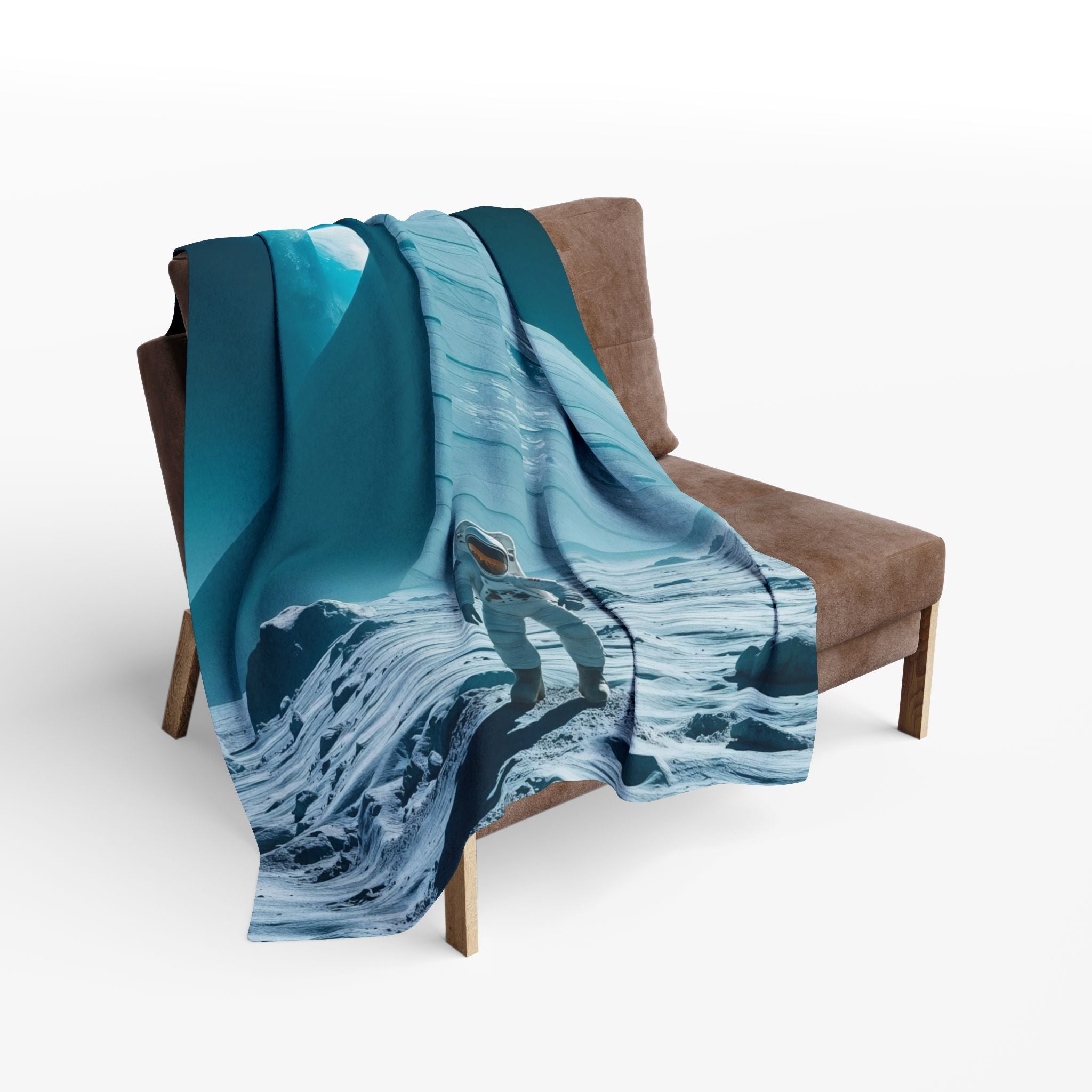 Fleece cosy blanket featuring an old huge pyramid on the moon with a space man draped over a brown chair with a white background.