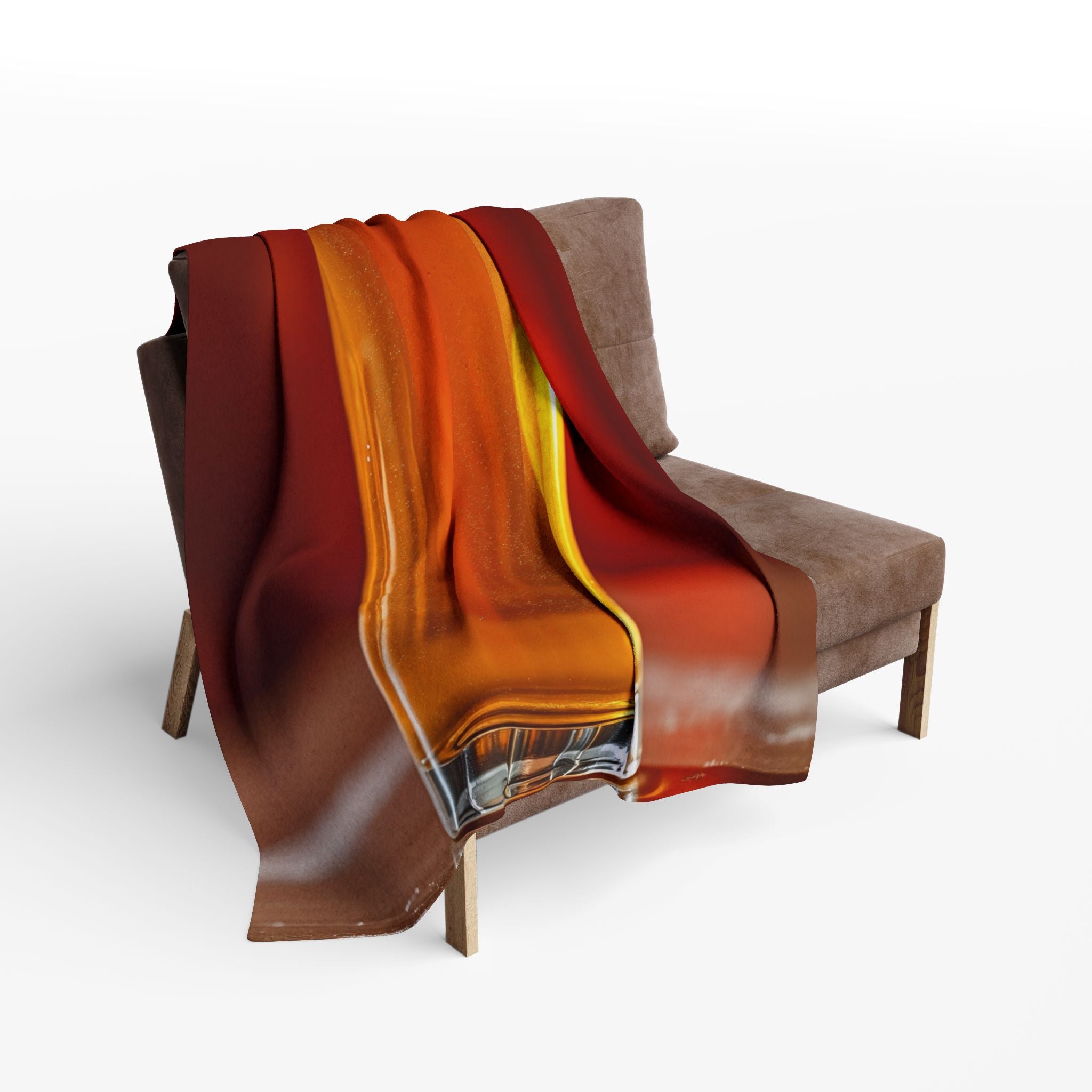 Gradient blanket draped over a chair on a white background.