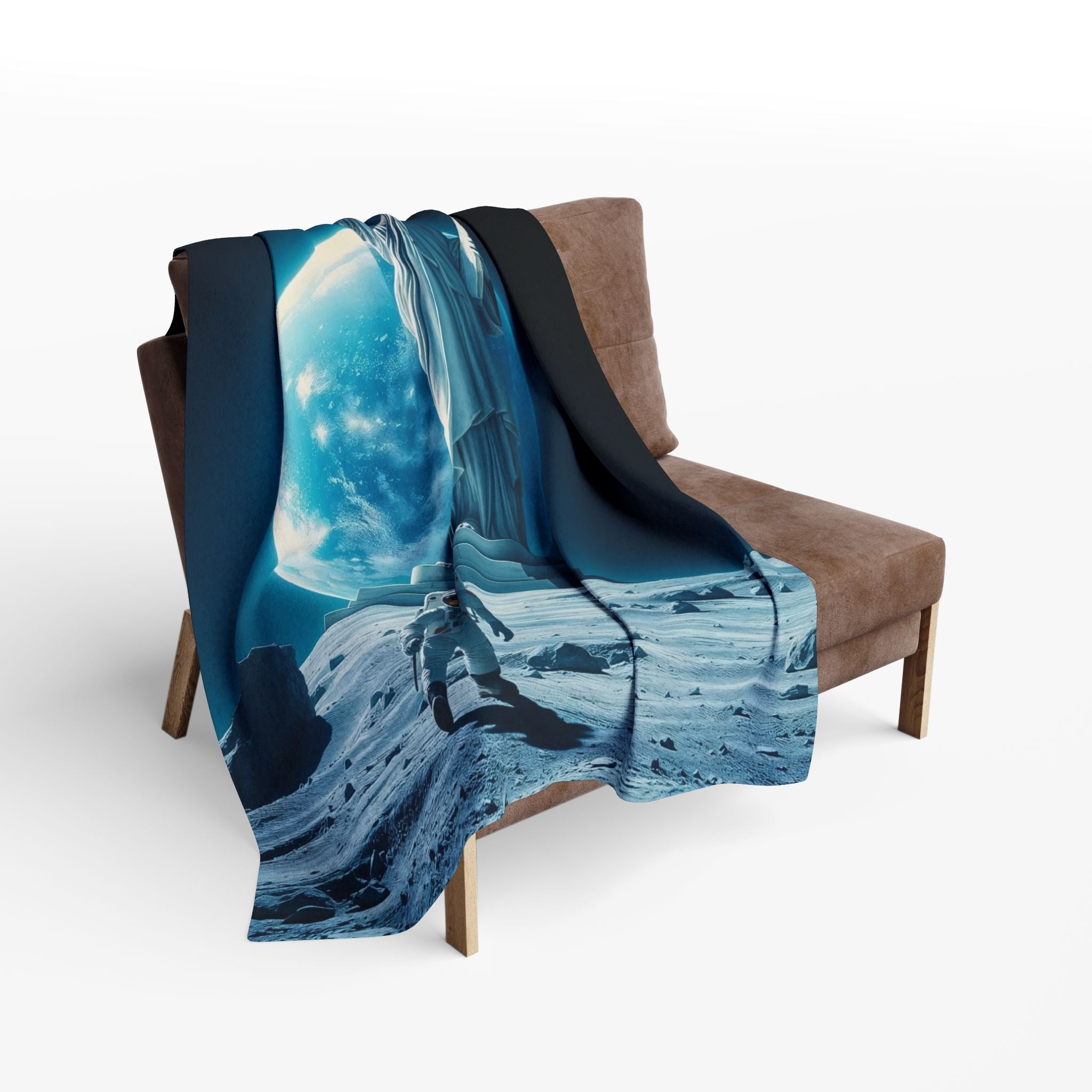 Fleece blanket with the statue of liberty on the moon with an astronaut draped over a brown chair on a white background.