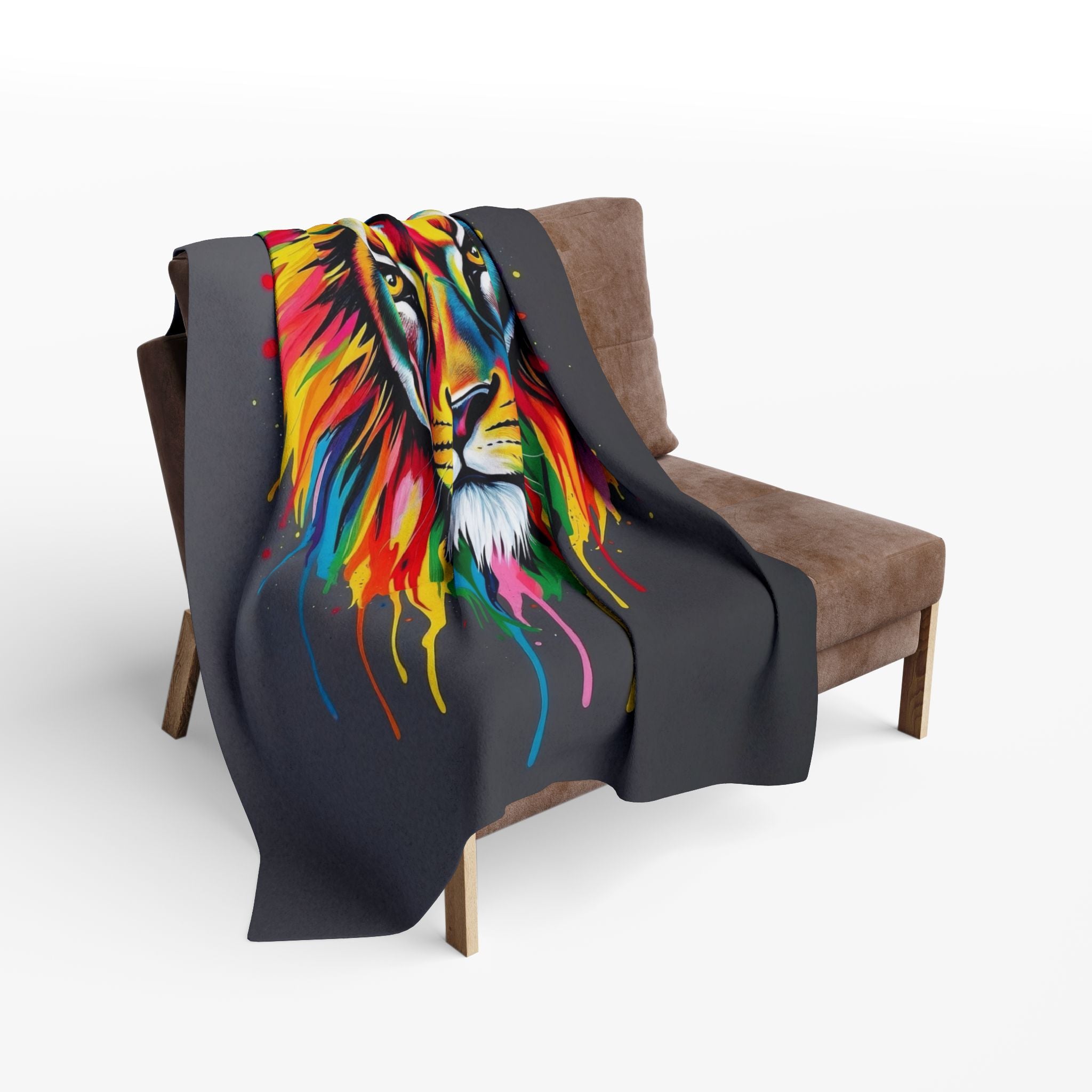 Multicoloured abstract lion blanket draped over a brown chair on a white background.