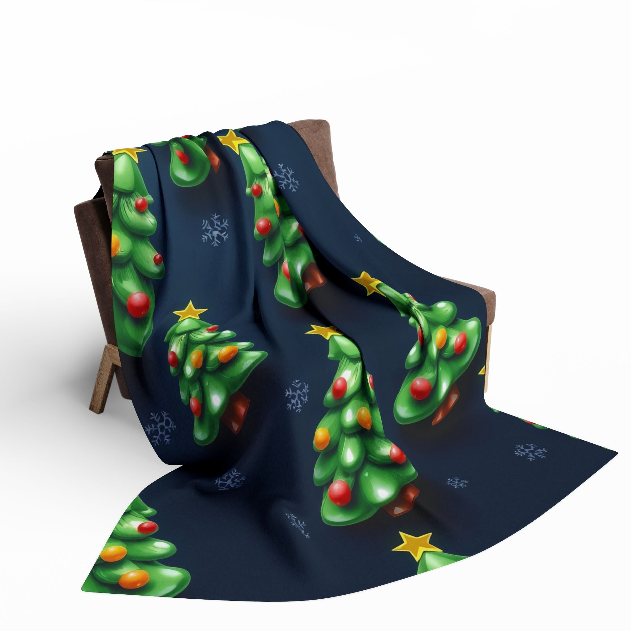 Christmas-themed blanket with christmas trees and decorations on a blue background.