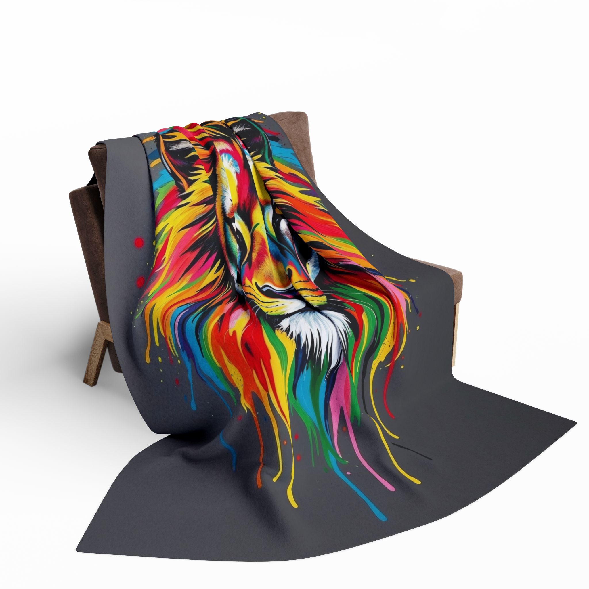 Multicoloured abstract lion design blanket draped over a chair on a white background.