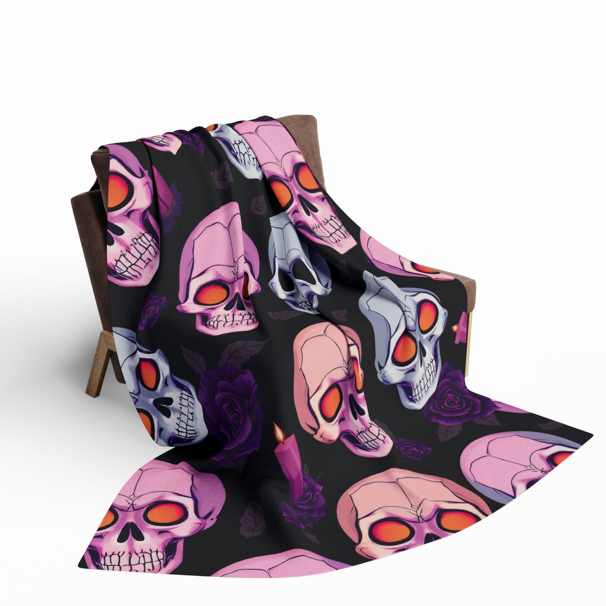 Colorful halloween skull patterned blanket draped over a chair on a white background.