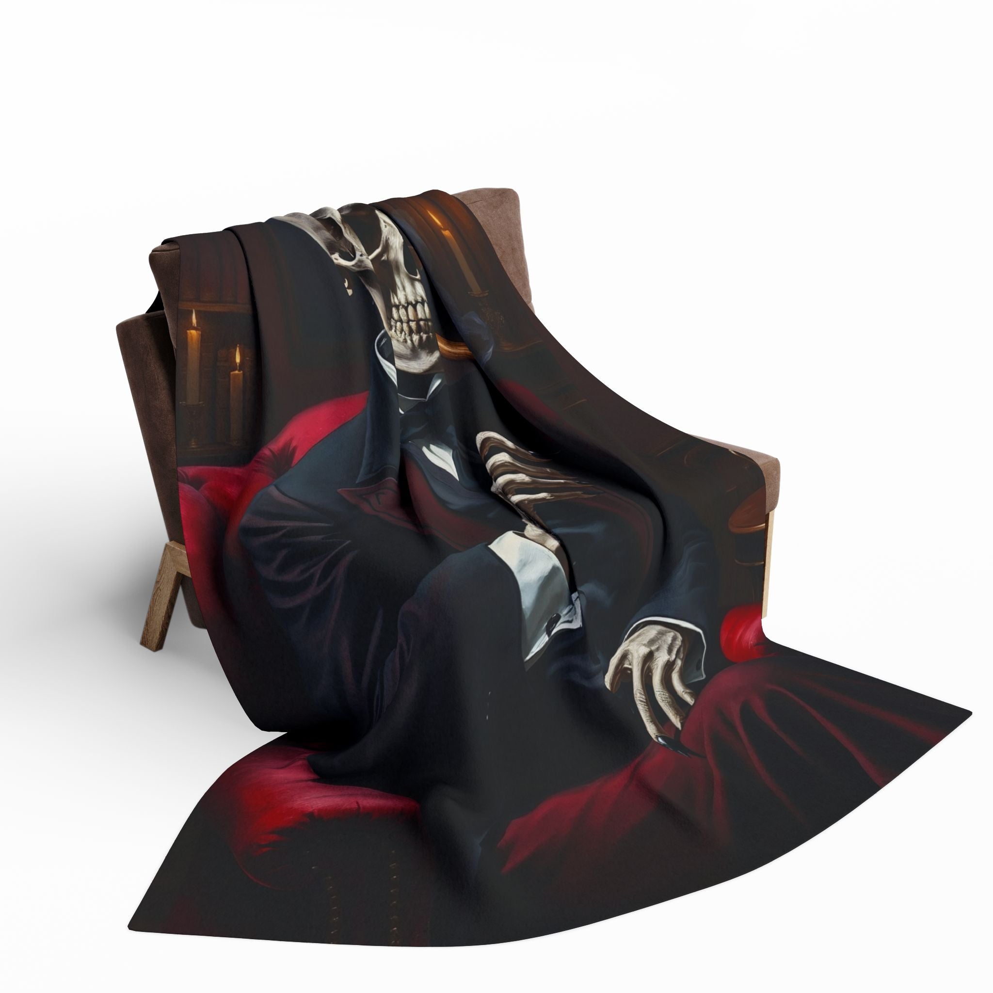 Decorative blanket with a Victorian skull design draped over a chair on a white background.
