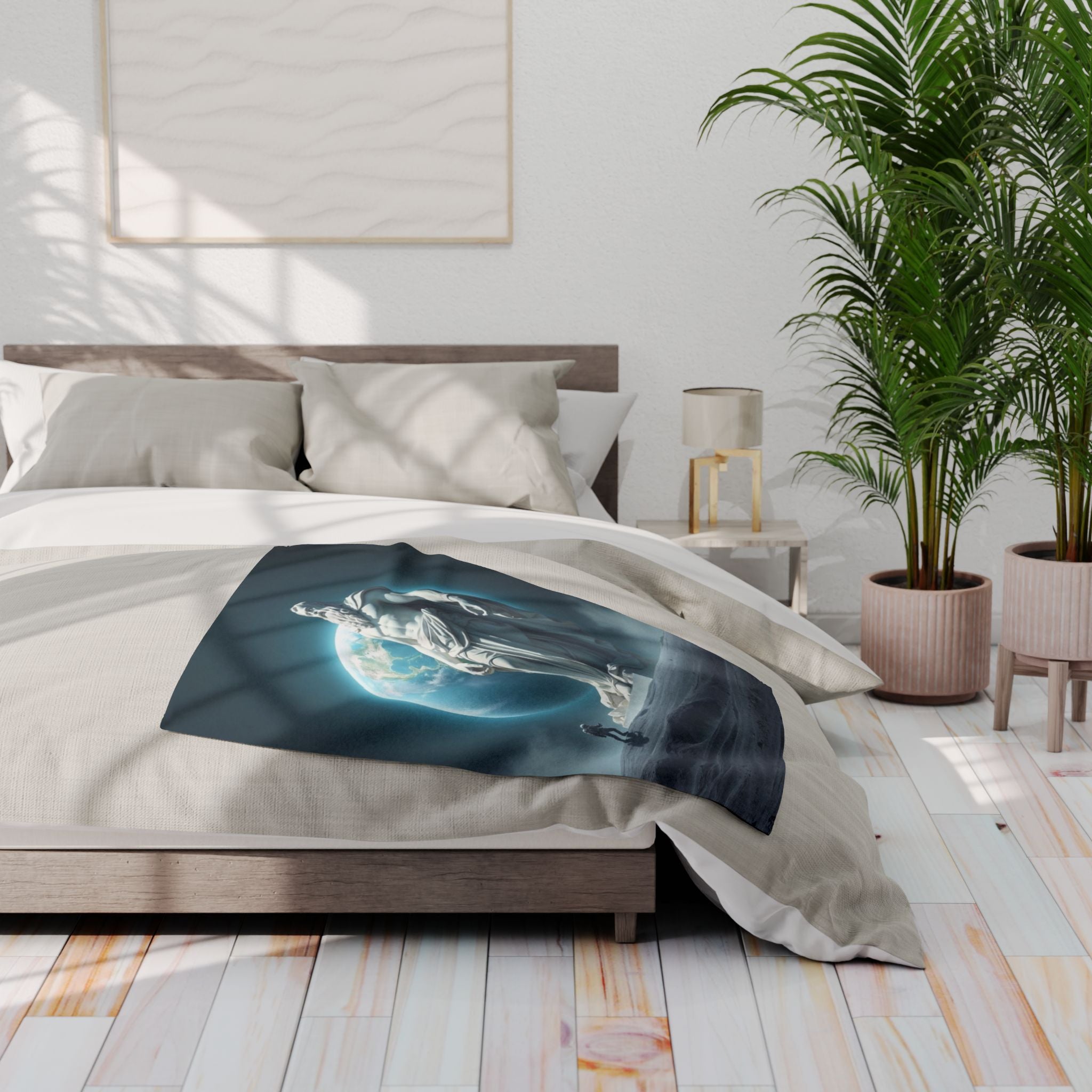 Bed with a decorative fleece blanket featuring a statue of ancient greek god zeus on the moon with an astronaut in a bedroom setting.