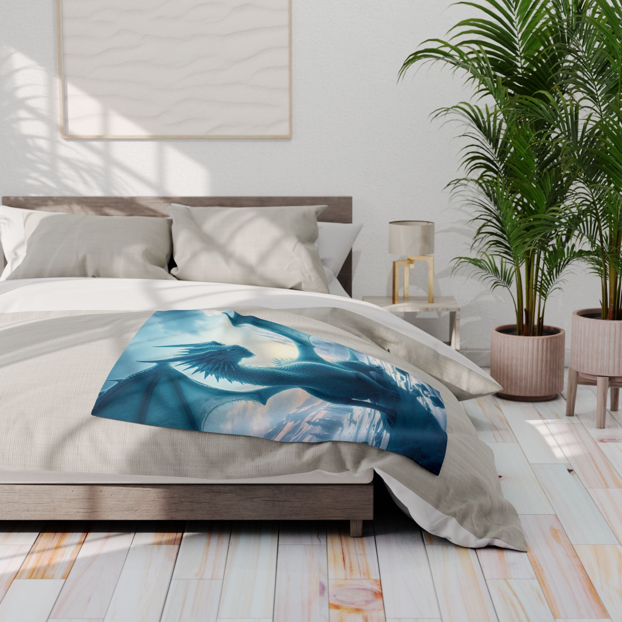 Bedroom with a bed featuring a blue ice dragon blanket.