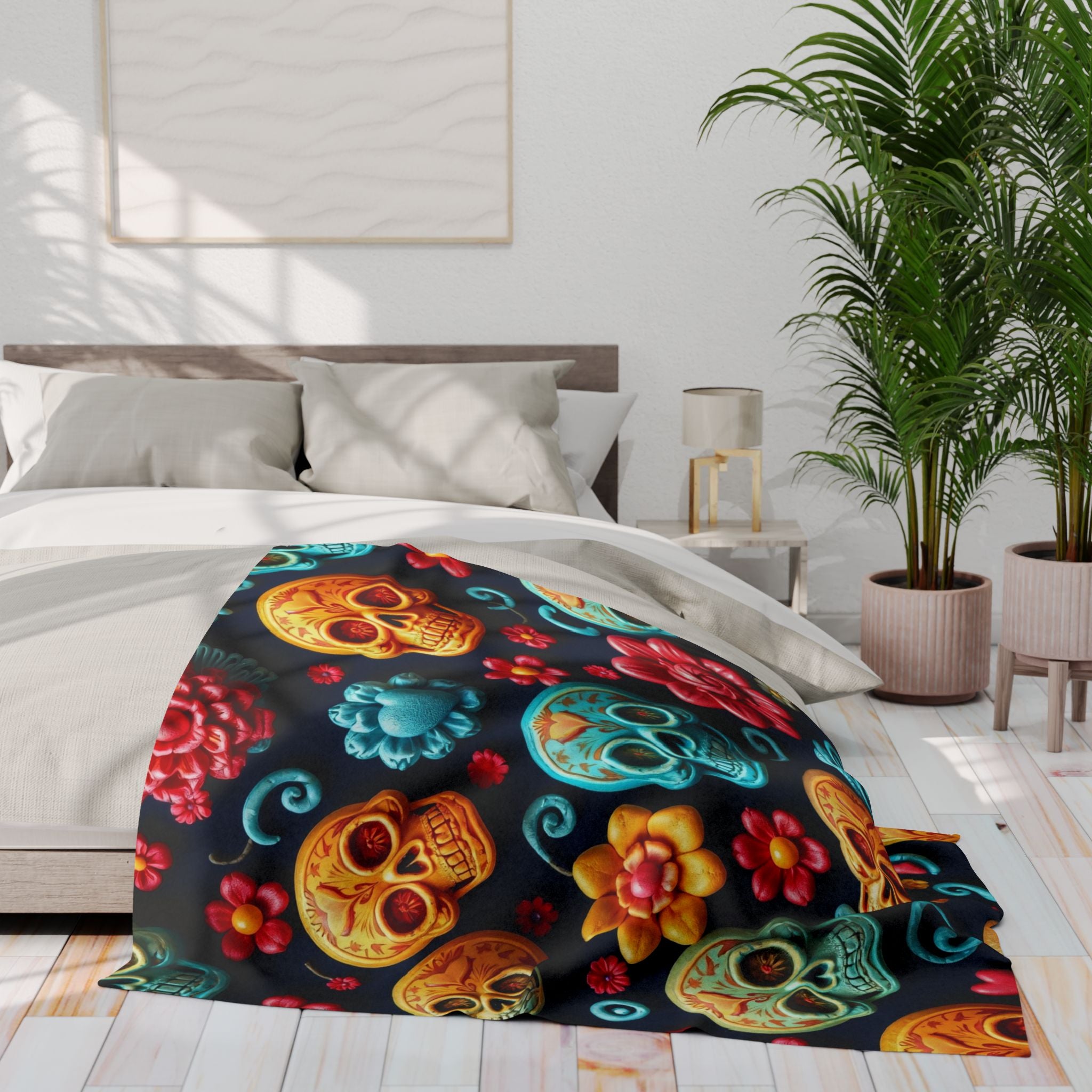 Colorful mexican sugar skull and floral patterned blanket on a bed in a bright bedroom.