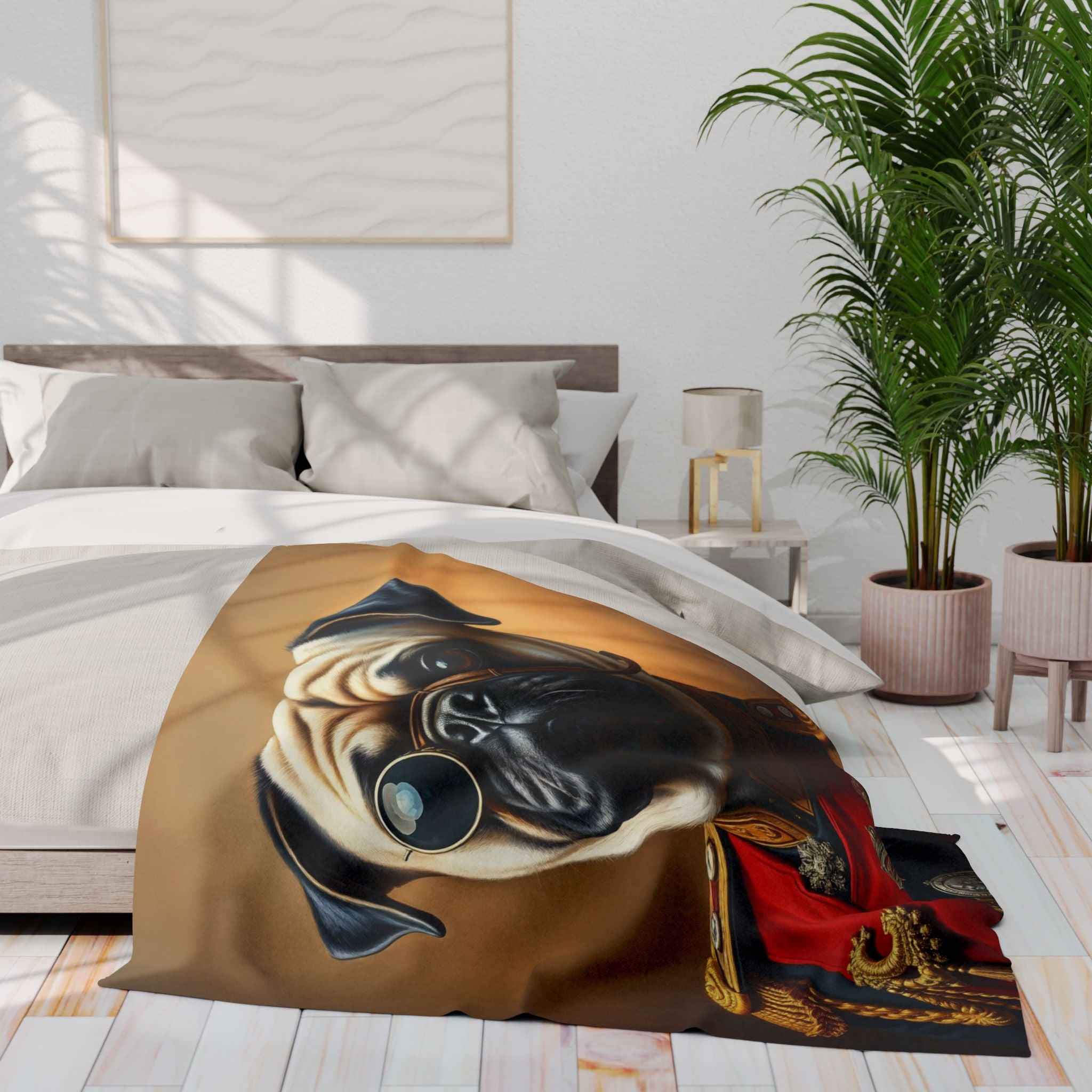 Bed with a decorative fleece blanket featuring a pug design dressed in regal military uniform in a modern bedroom setting.