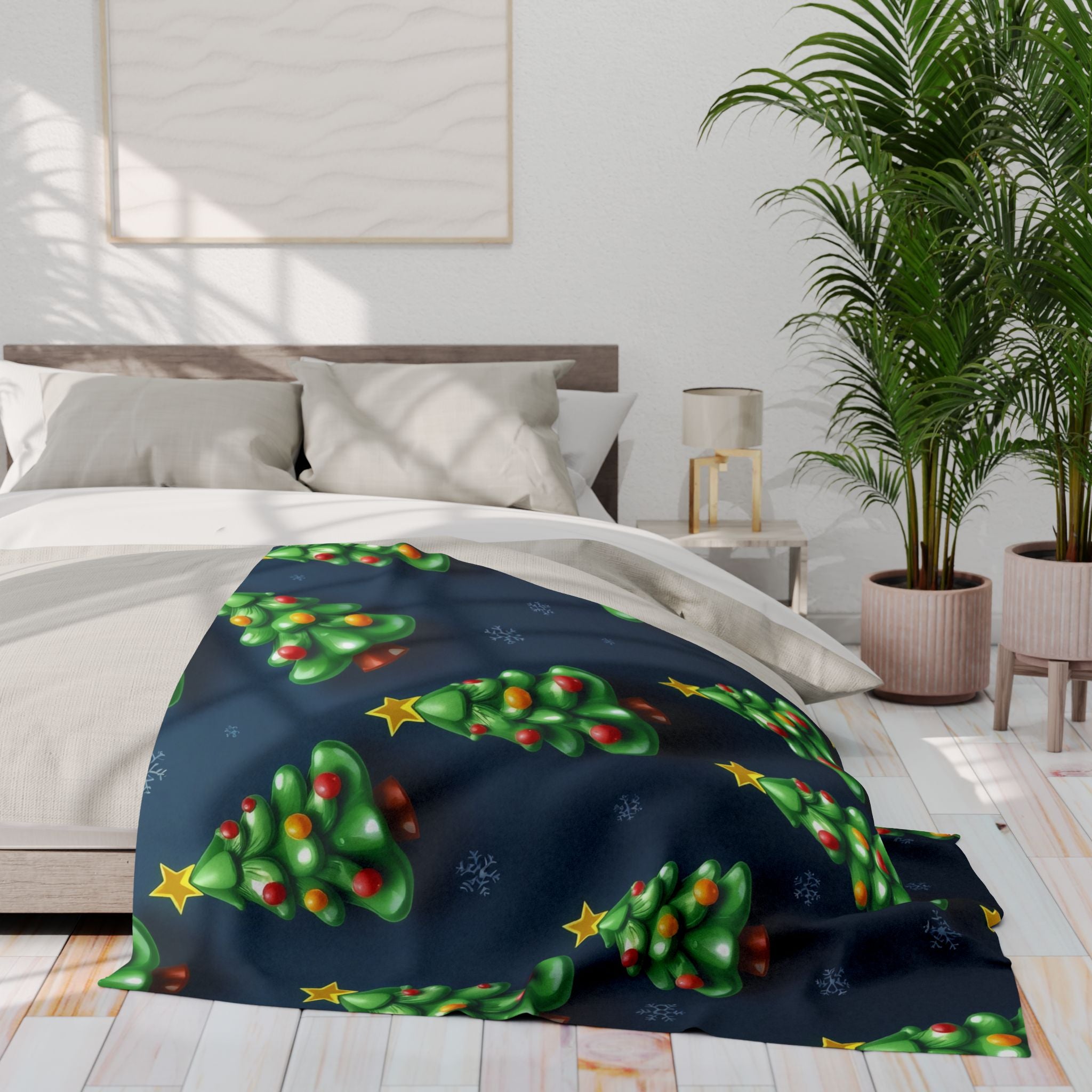 Decorative blanket with Christmas tree pattern on a bed in a bedroom setting
