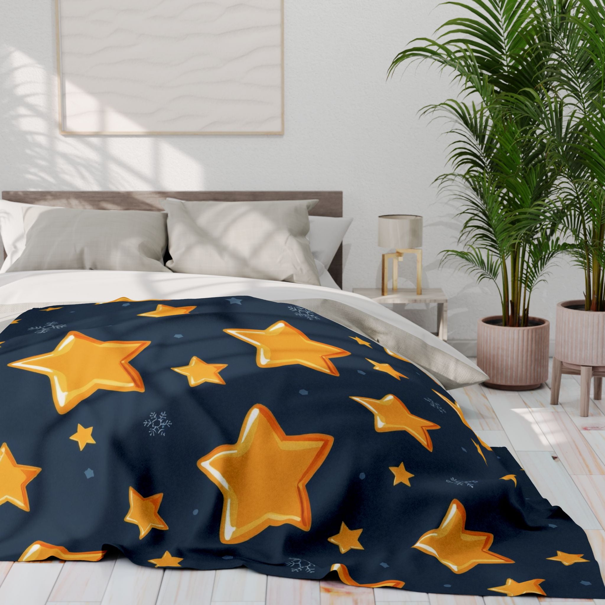 Bed with star-patterned fleece blanket in a bright bedroom.
