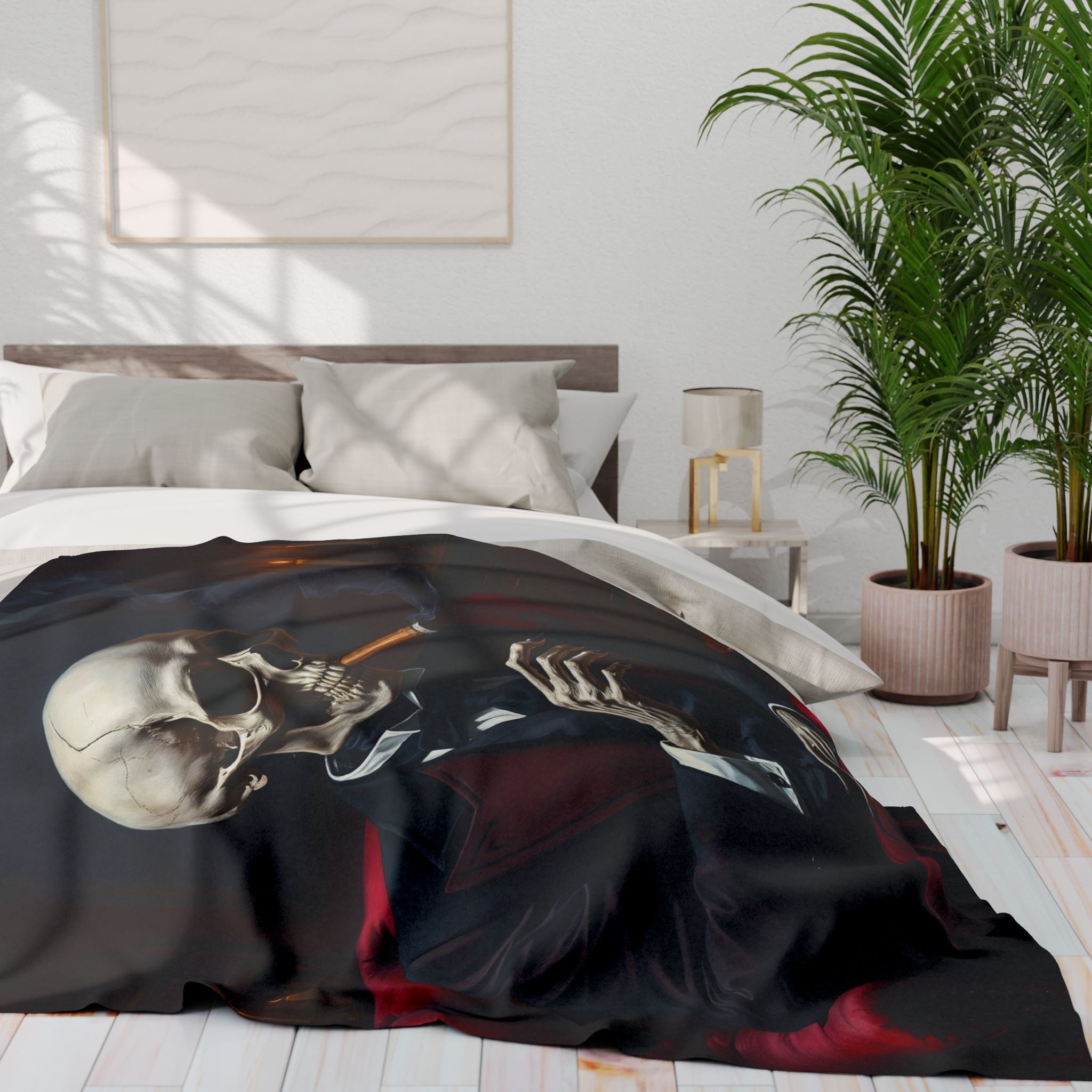 Bed with a victorian skeleton design blanket in a bedroom setting.