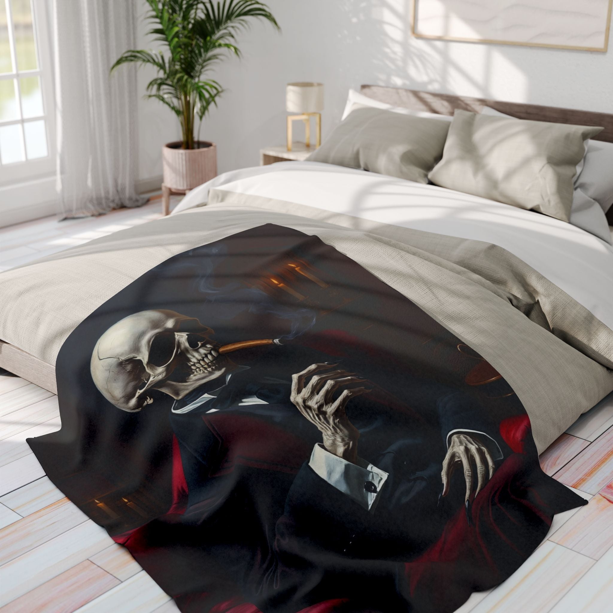Sleek black and red skeleton design fleece blanket on a bed in a bright bedroom.