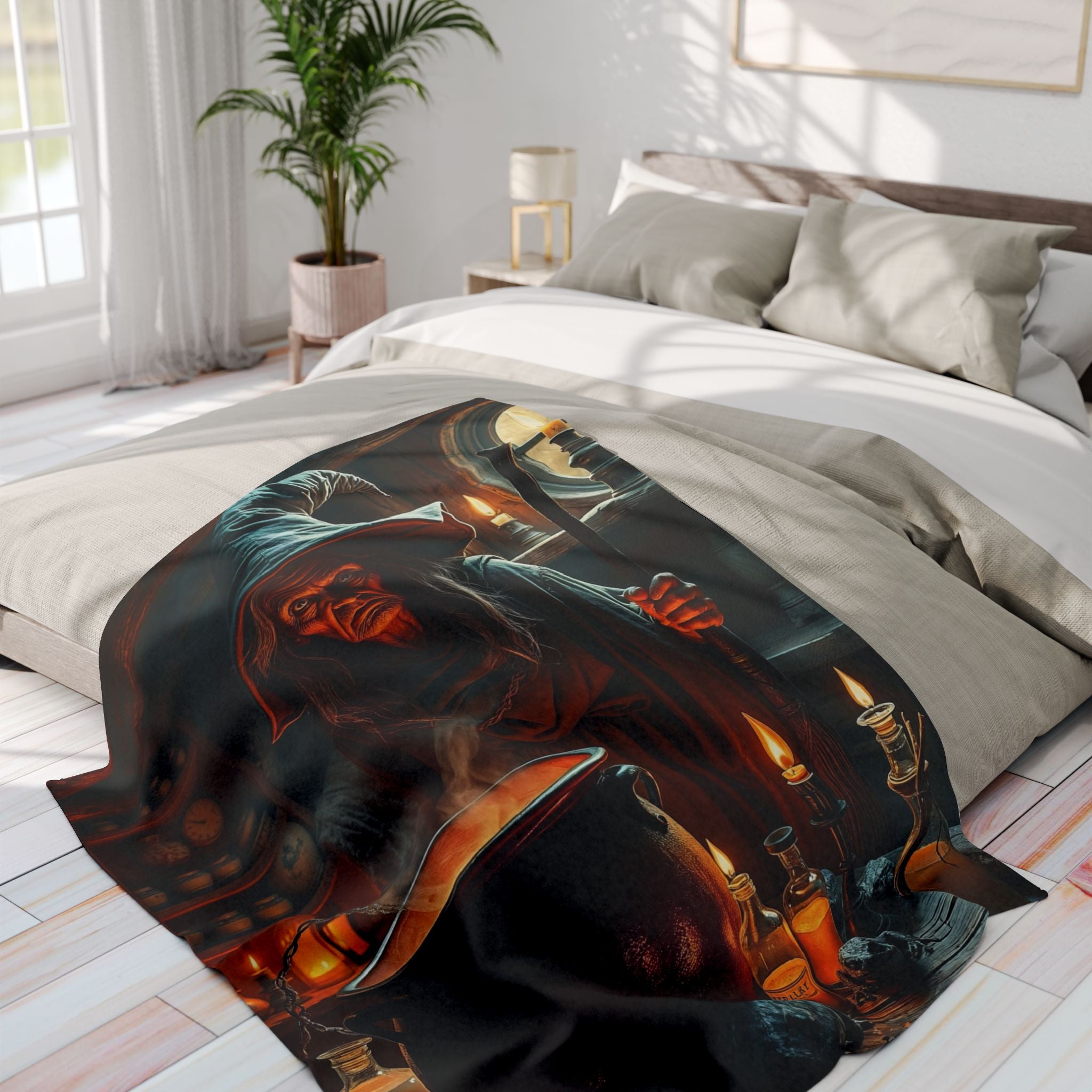 Decorative fleece blanket with a gothic halloween witch design on a bed in a bright bedroom.