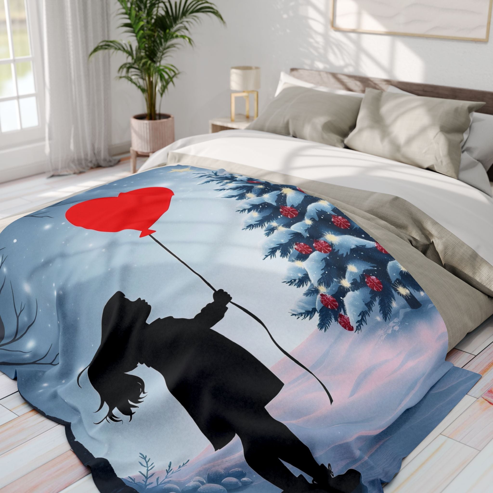Bed with a decorative blanket featuring a silhouette of a girl holding a red balloon against a snowy landscape.