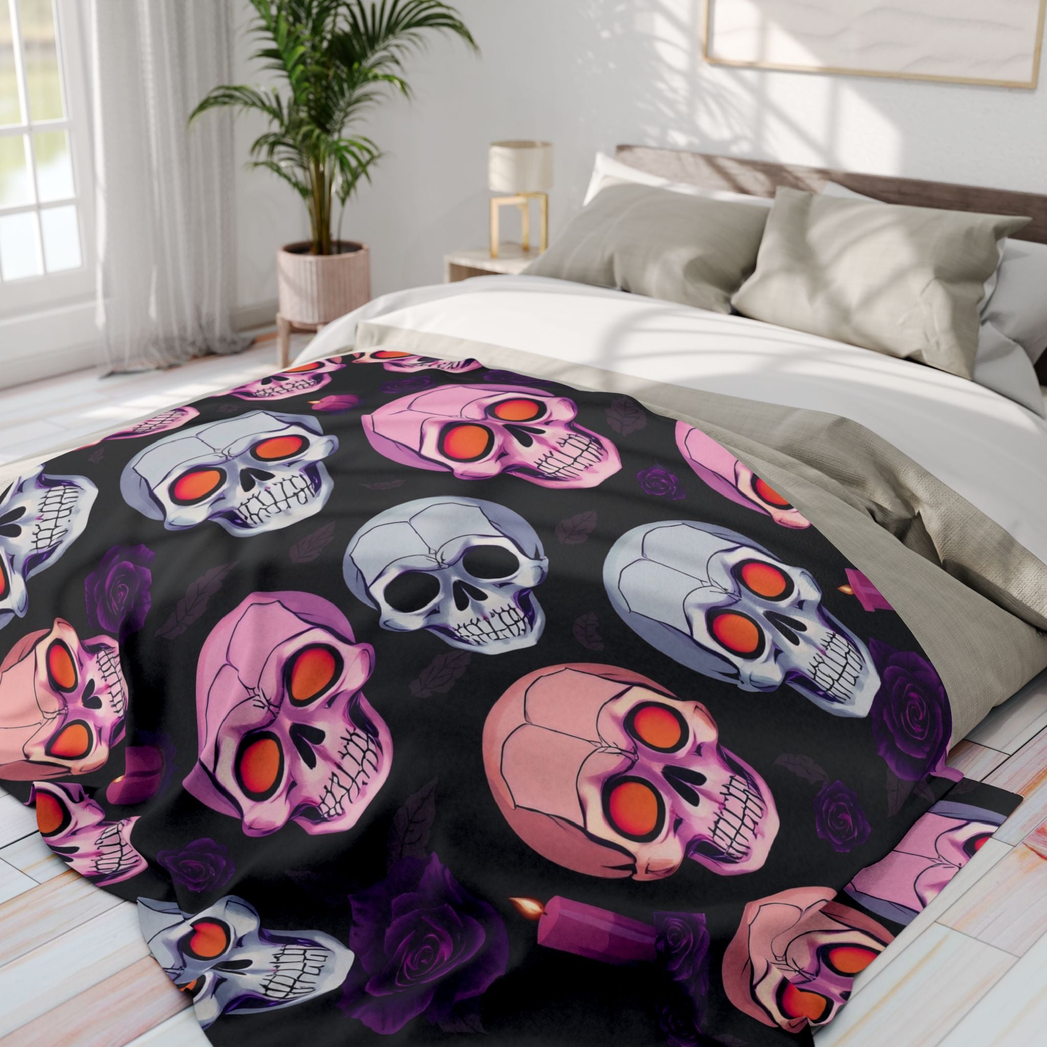 Halloween fleece blanket with a colorful skull and purple rose design on a bed in a bedroom.