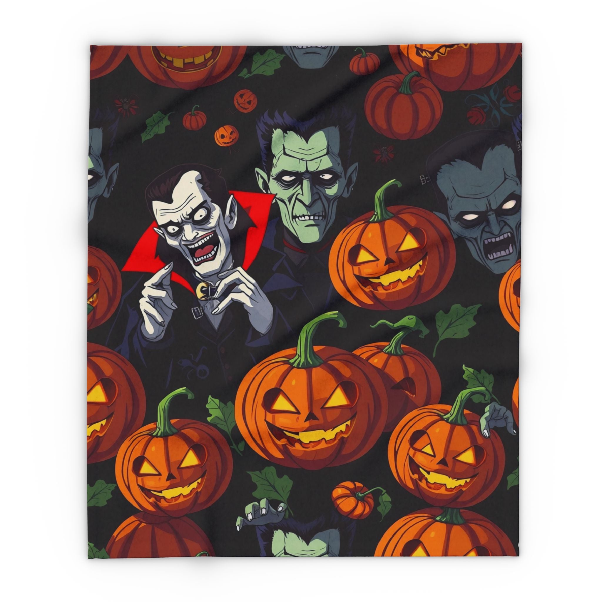 Halloween themed fleece blanket with vampires, Dracula, Frankenstein and pumpkin lanterns on a dark background.