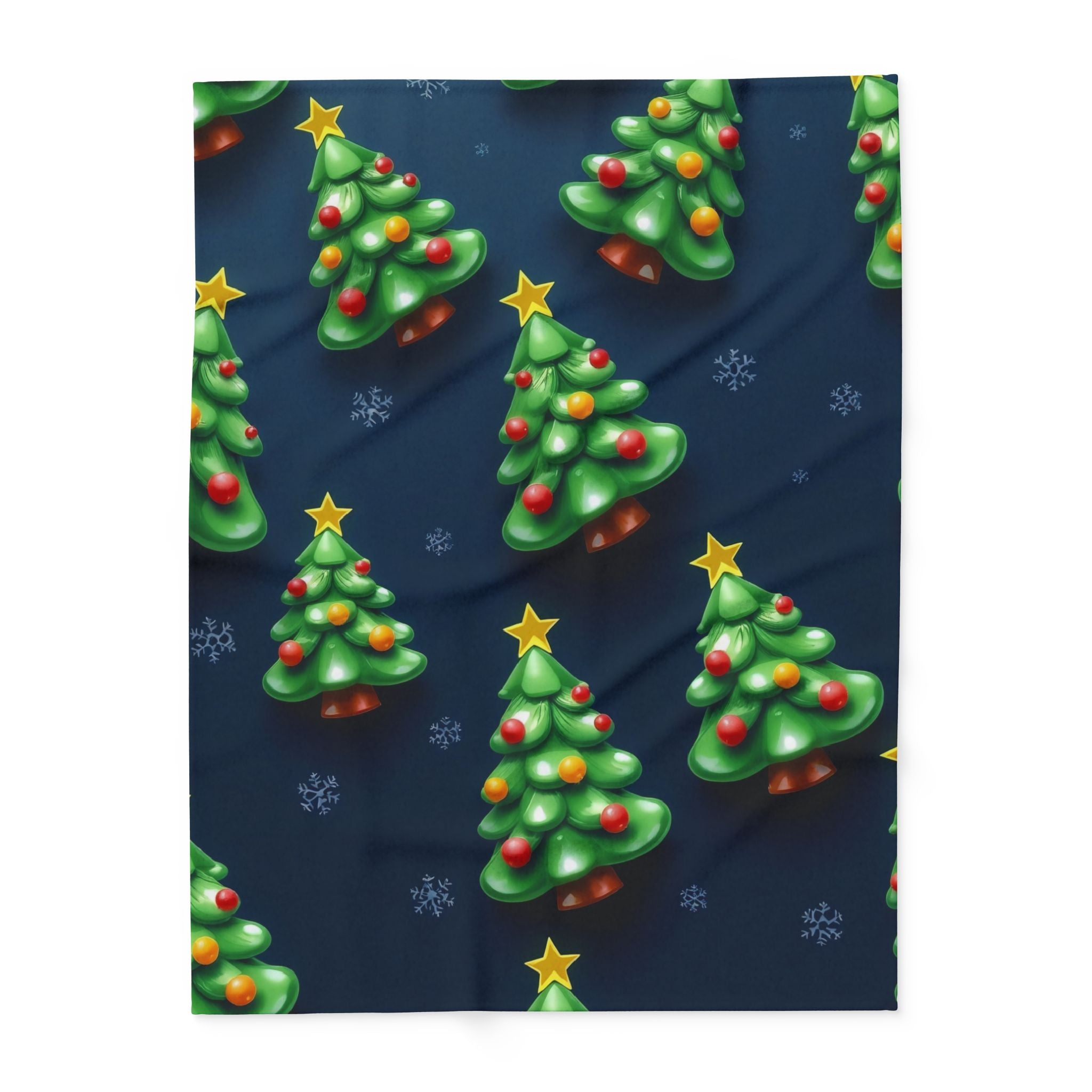 Fleece blanket with pattern of Christmas trees with stars and decorations on a blue background.