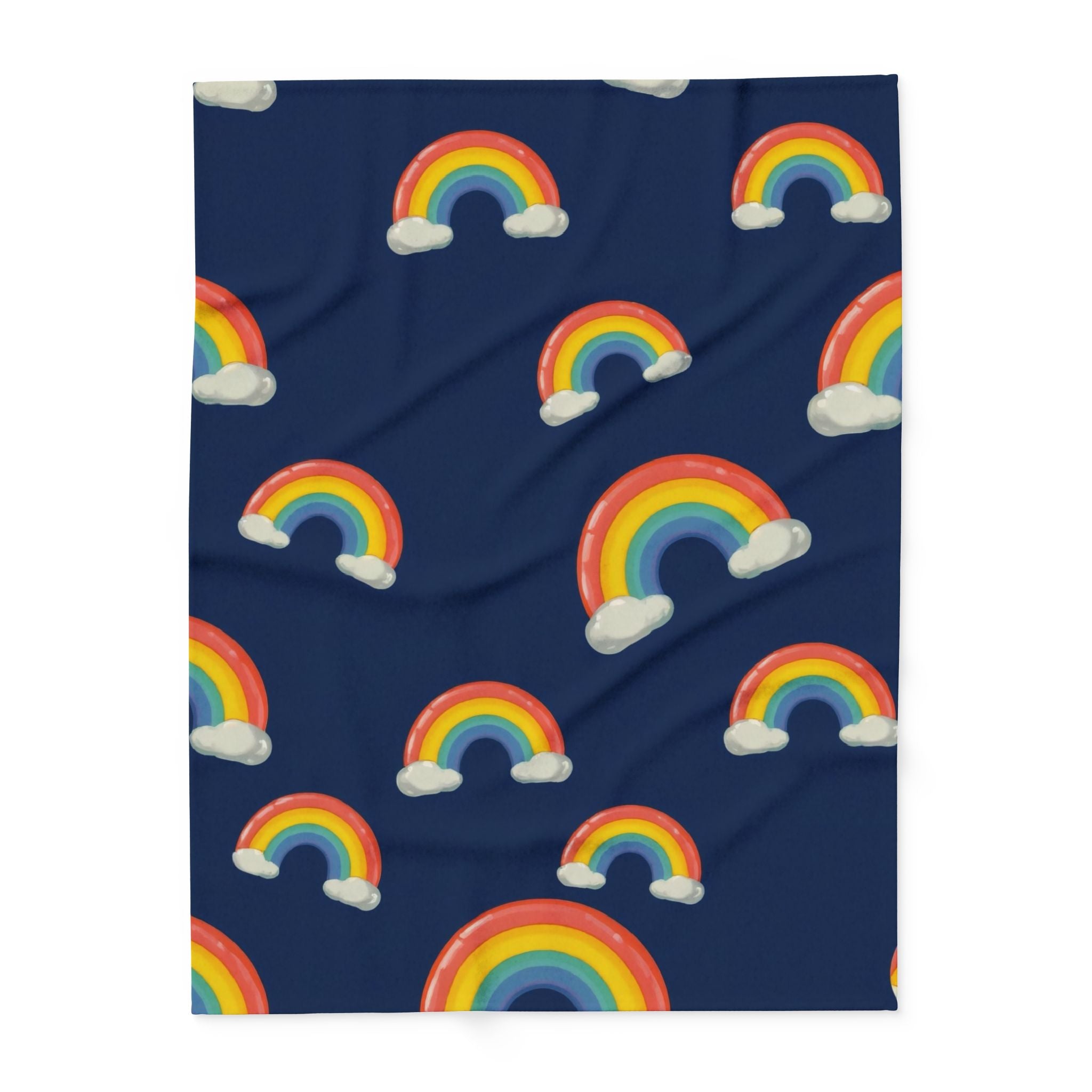Navy blue fleece blanket with rainbow and cloud pattern.