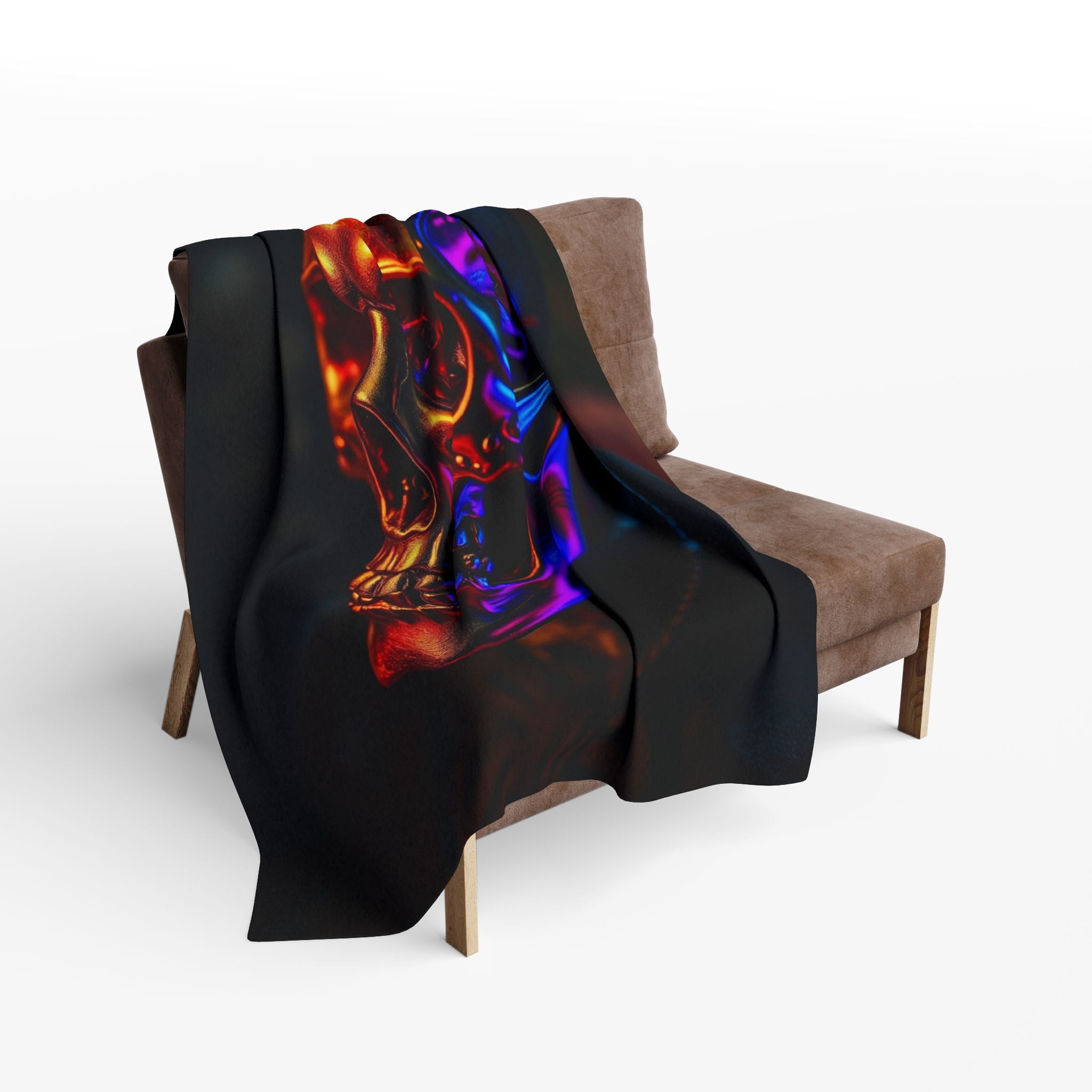 A golden luminous skull blanket design draped over a brown chair on a white background.