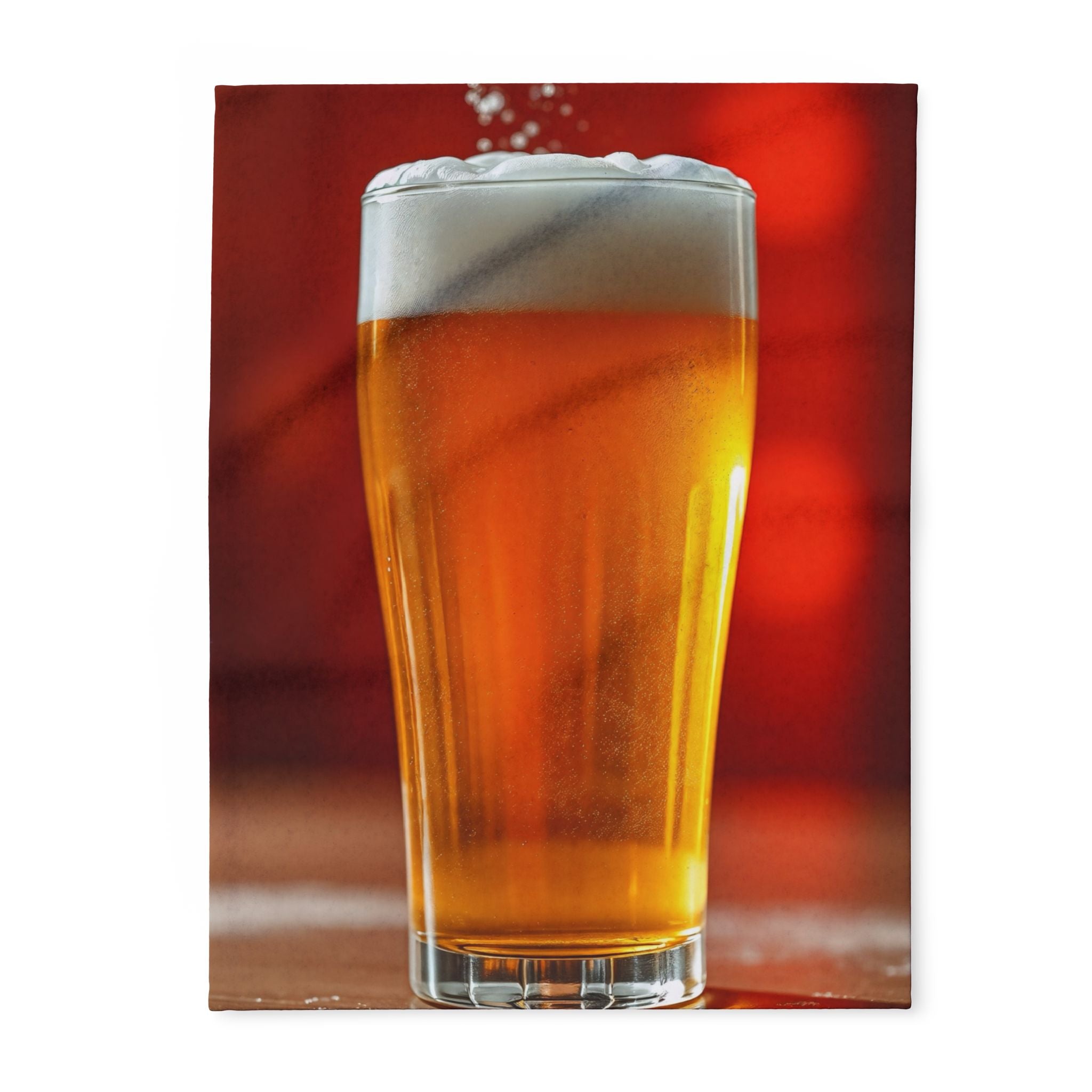 Printed fleece blanket of a glass of beer with a red blurred background.