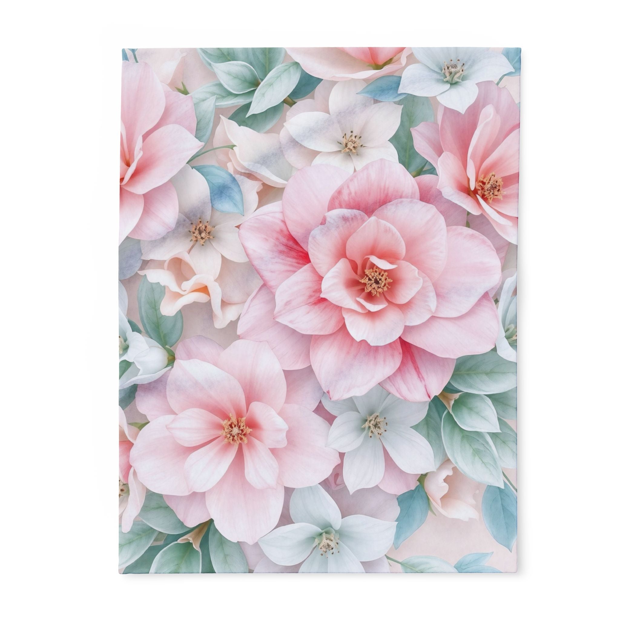 Warm fleece blanket with floral pattern with pink and white flowers on a white background.