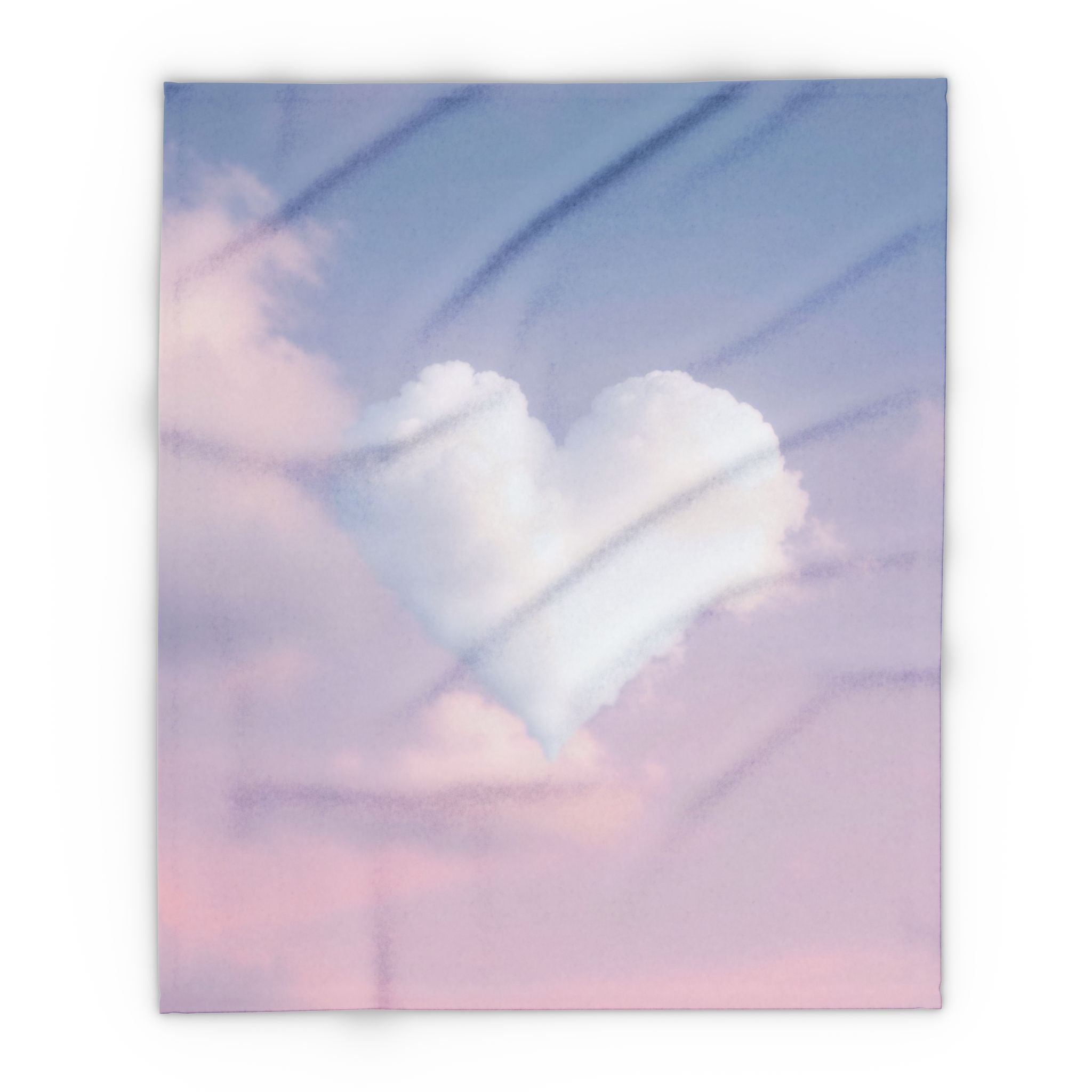 Fleece blanket featuring a pastel coloured  heart shaped cloud on a pink and blue sky.