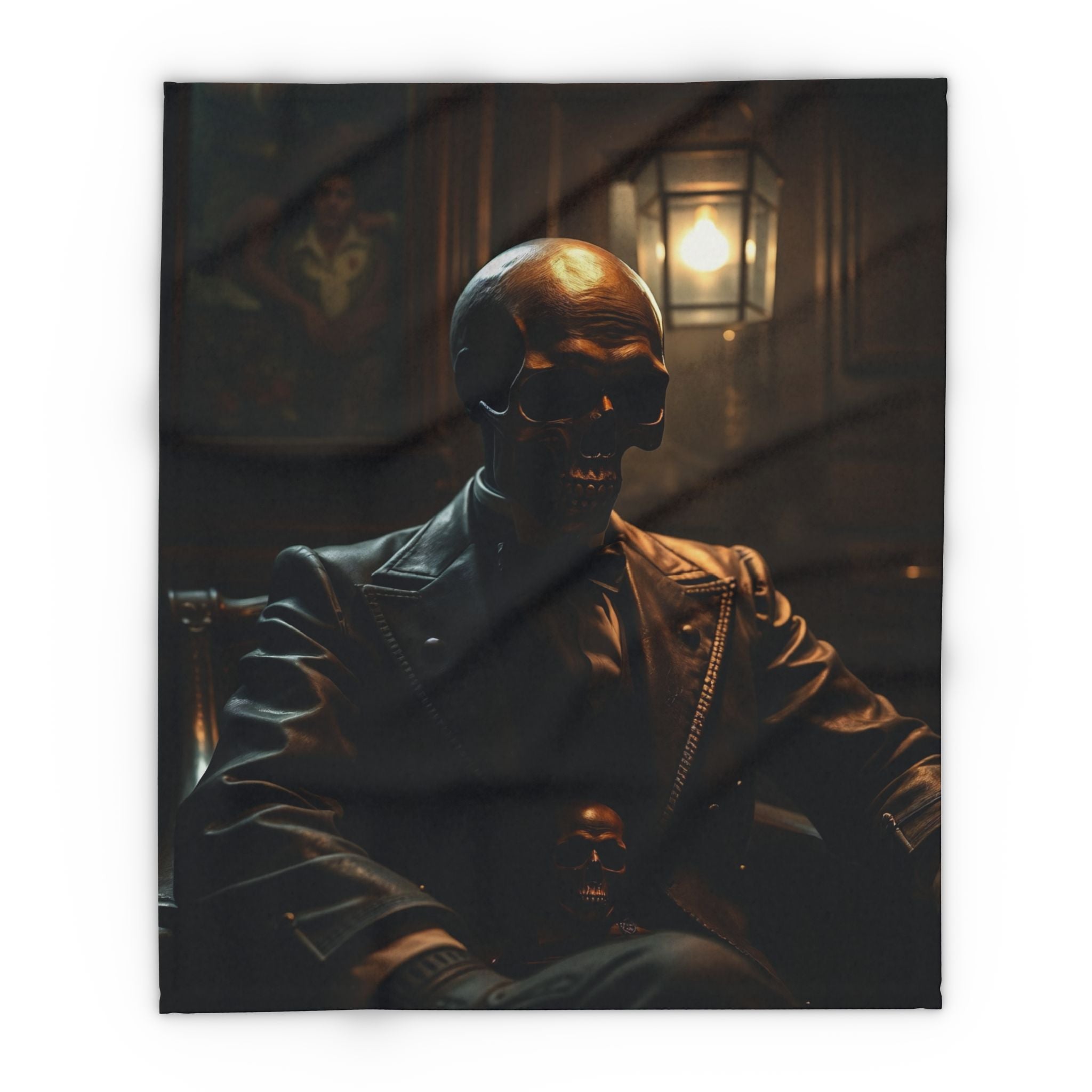 Black fleece blanket featuring a gothic skeleton sitting in a chair.