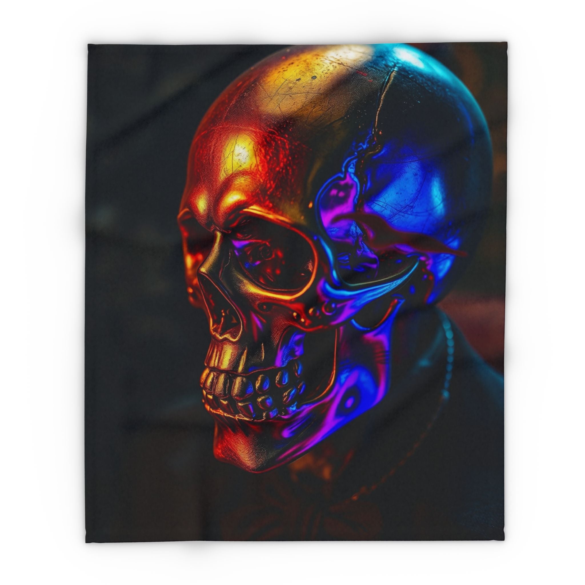 Golden ultraviolet skull design fleece blanket on a dark background.